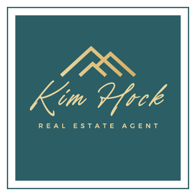 Logo mark for Kim Hock, Real Estate Agent featuring text on a teal background with icon of mountains